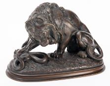 After Antoine-Louis Barye (French, 1796-1875), a patinated bronze group, Lion and Serpent No. 2