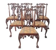 A set of six stained beech dining chairs in the Chippendale manner, late 19th/early 20th Century,