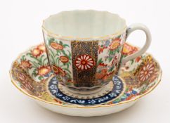 A First Period Worcester fluted coffee cup and saucer decorated in the 'Rich Queen's' Japan pattern