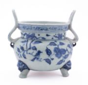 A Chinese blue & white tripod vessel of 'Ding' form with curved upright handles, painted with birds,