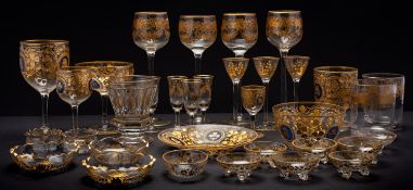 A mixed group of French and other table glass with gilt embellished intaglio decoration,