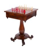 A Victorian mahogany games table,