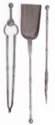 A set of steel fire irons in George III style, 19th century; comprising shovel,