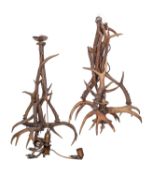 Two similar deer antler electroliers, circa 1900;