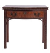 A George III mahogany serpentine front tea table, in Chippendale style,