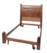 An oak bedstead,