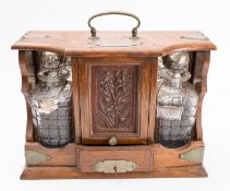 An oak and metal mounted tantalus,