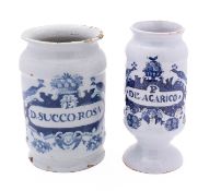 Two Dutch blue and white delftware drug jars, 18th century each painted with an ornate cartouche,