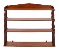 A set of Victorian mahogany hanging shelves, late 19th Century; of openwork form,