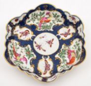 A First Period Worcester teapot stand of lobed hexagonal form,