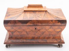 A fine early Victorian walnut parquetry tea caddy, mid 19th century; of sarcophagus form,