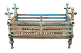 A substantial cast iron basket grate, 20th century and later painted; of rectangular form,