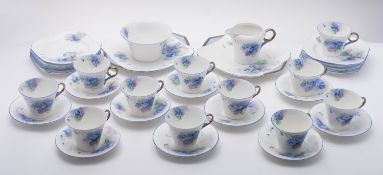 A Shelley porcelain Regent tea service in the Violets pattern, comprising eleven cups, ten saucers,