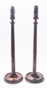 A pair of mahogany columnar table lamps in George III style,