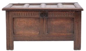 A carved oak coffer,