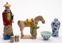 A mixed group of Chinese ceramics comprising a horse and groom in the Tang manner,