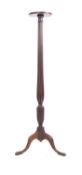 A Victorian mahogany torchere stand, mid 19th Century; with circular top,