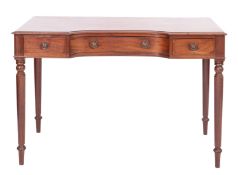 A Victorian mahogany concave front dressing table,