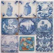 A group of eight blue and white Delft tiles,