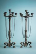 A pair of Louis Philippe patinated bronze six light candelabra, circa 1825;