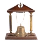 A Victorian brass and oak mounted table bell,
