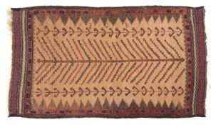 A Balouch flatweave rug, the camel field with a central line of serrated chevrons,