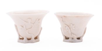 A Chinese blanc de chine prunus libation/wine cup, late17th/18th century, 6cm; and one other,