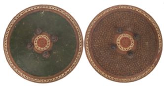 Two similar north-west Indian, probably Rajasthani painted leather dhal shields,