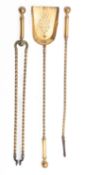 A set of brass fire tools, early 20th century; comprising shovel,