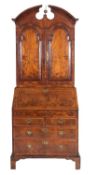 A Queen Anne walnut and feather banded bureau cabinet,