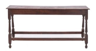 An oak long box stool in Jacobean style,