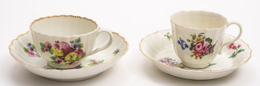A First Period Worcester teacup and saucer and one similar both of fluted form,