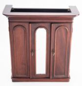 A miniature Victorian model of a press compactum,