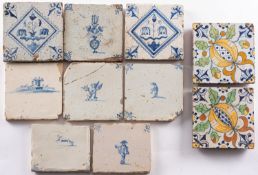 Eight delft tiles painted in blue with animal and figural subjects and some flora,