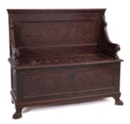 An Italian walnut box settle in 17th Century style,