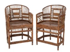 A pair of bamboo and canework elbow chairs,