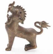 A Buddhistic bronze incense burner modelled as a dog of Fo, early 20th century, 15cm high.