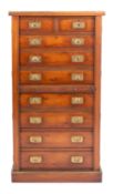 A yew wood and brass banded Wellington tallboy in Campaign style,