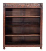 A Victorian oak open bookcase, in Renaissance revival taste,