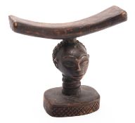 An African carved wood headrest, probably Luba Tribe, Congo,