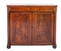 A Victorian mahogany side cabinet, circa 1860; with plain frieze draw above twin panel doors,