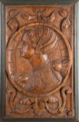 A pair of relief carved oak Romayne panels,