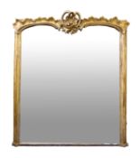 A substantial Victorian carved and giltwood framed overmantel mirror, in Rococo Revival taste,
