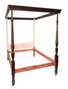 A mahogany and oak four post bed in George III taste,