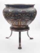 A large Chinese bronze and champlevé enamel jardiniere decorated with taotie masks and mythical