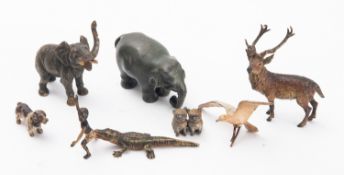 A small group of metal models and figurines,