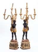 A pair of painted wood and composition figural four light candelabra, in 18th Century taste,