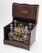 A French burrwood and inlaid table top spirit decanter case,