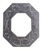 A pewter octagonal mirror frame in Arts & Crafts style,