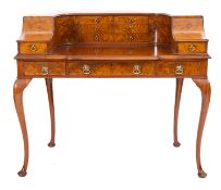 A walnut Carlton House desk in George III style, 20th century; of typical form,